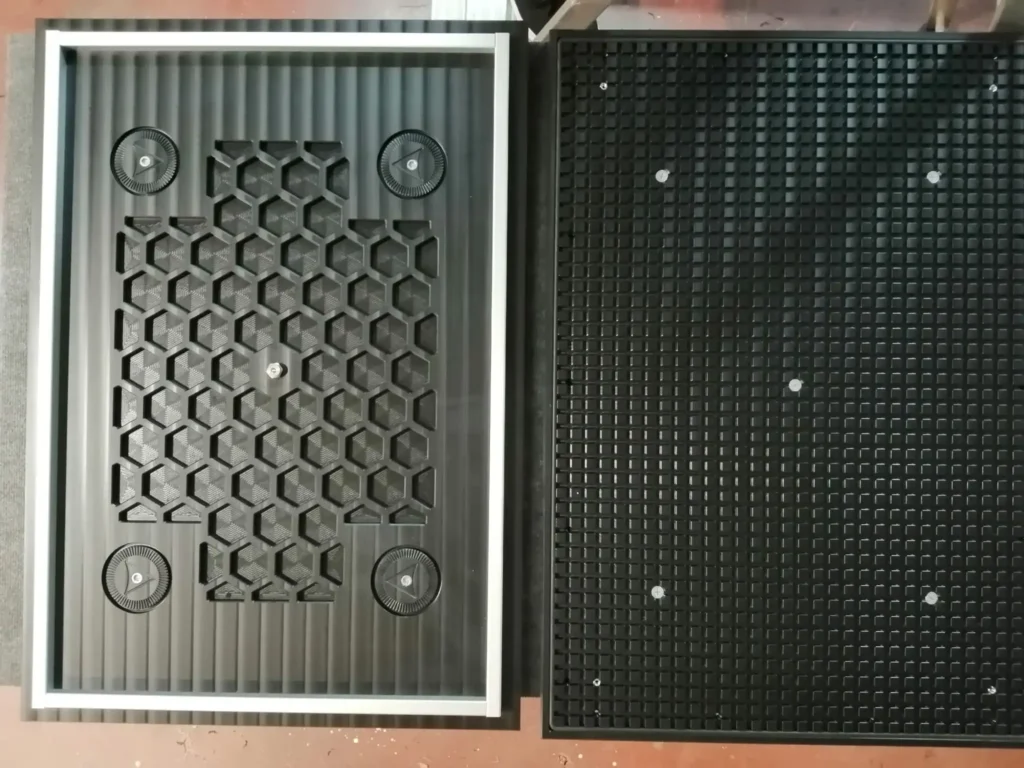 Flat CNC nesting table with distributed vacuum system for cutting, drilling and routing wood panels in a single operation